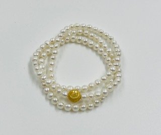 White Pearl Stretch Bracelets with a Gold Filled Bead