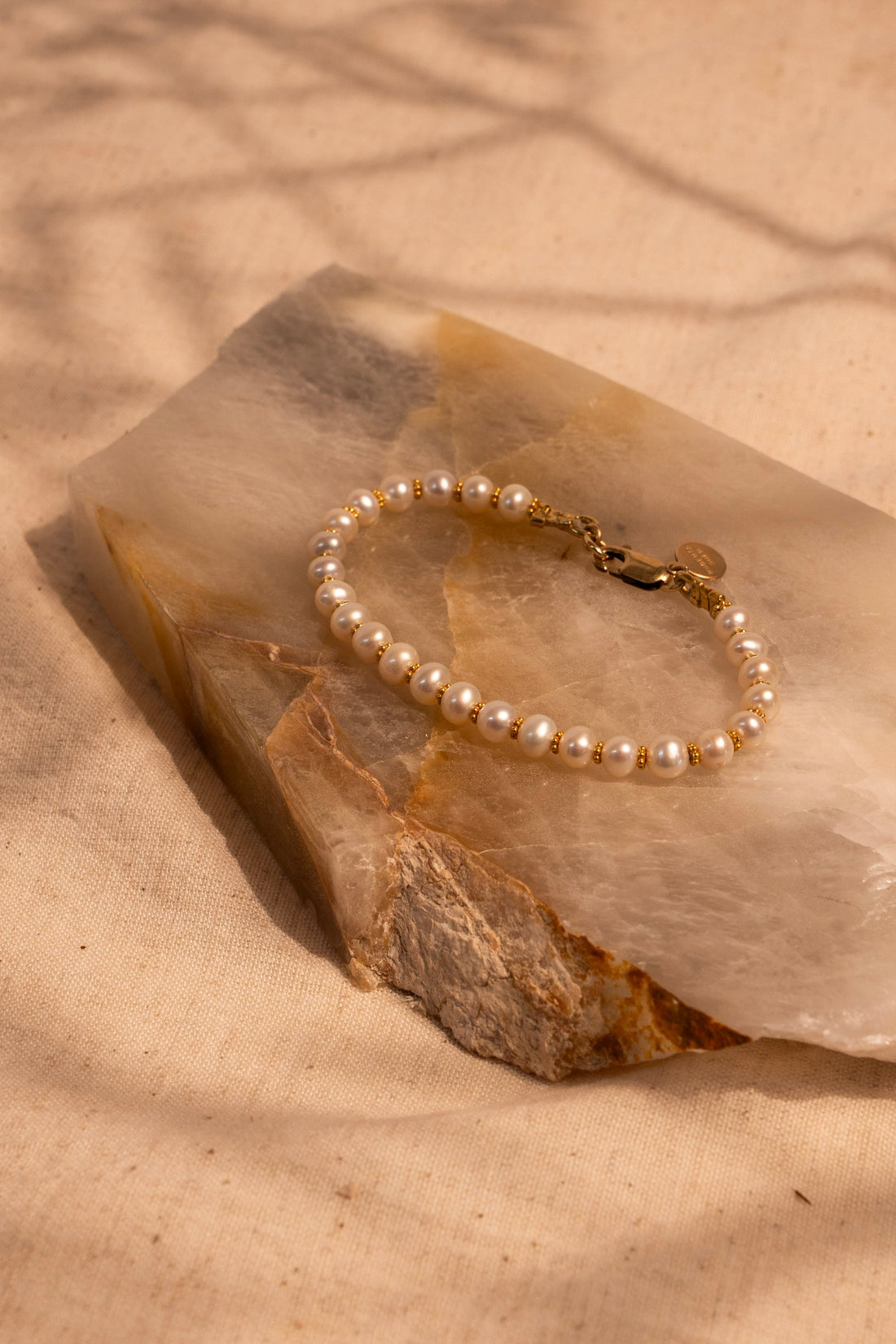 White Pearl and 18Kt gold Spacers hand made Bracelet. Shown in 7"