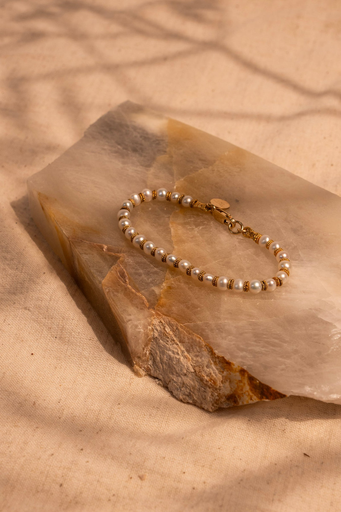 White Pearl and 18Kt gold Spacers hand made Bracelet. Shown in 7"