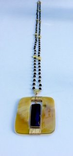 Polished Horn Necklace with a Semi Precious Stone Piece and a Gold Filled Chain 16" in length