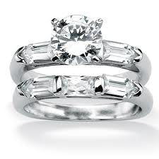 Round Center Stone with Side Baguettes and coordinating Baguettes on band