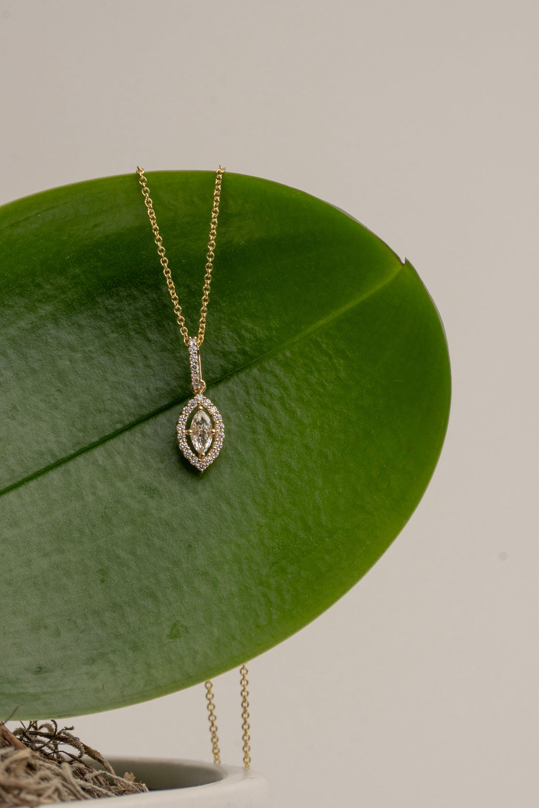 Marquise Diamond and 18Kt Gold Halo Necklace with a Diamond Halo and Diamond Bail 16" in length