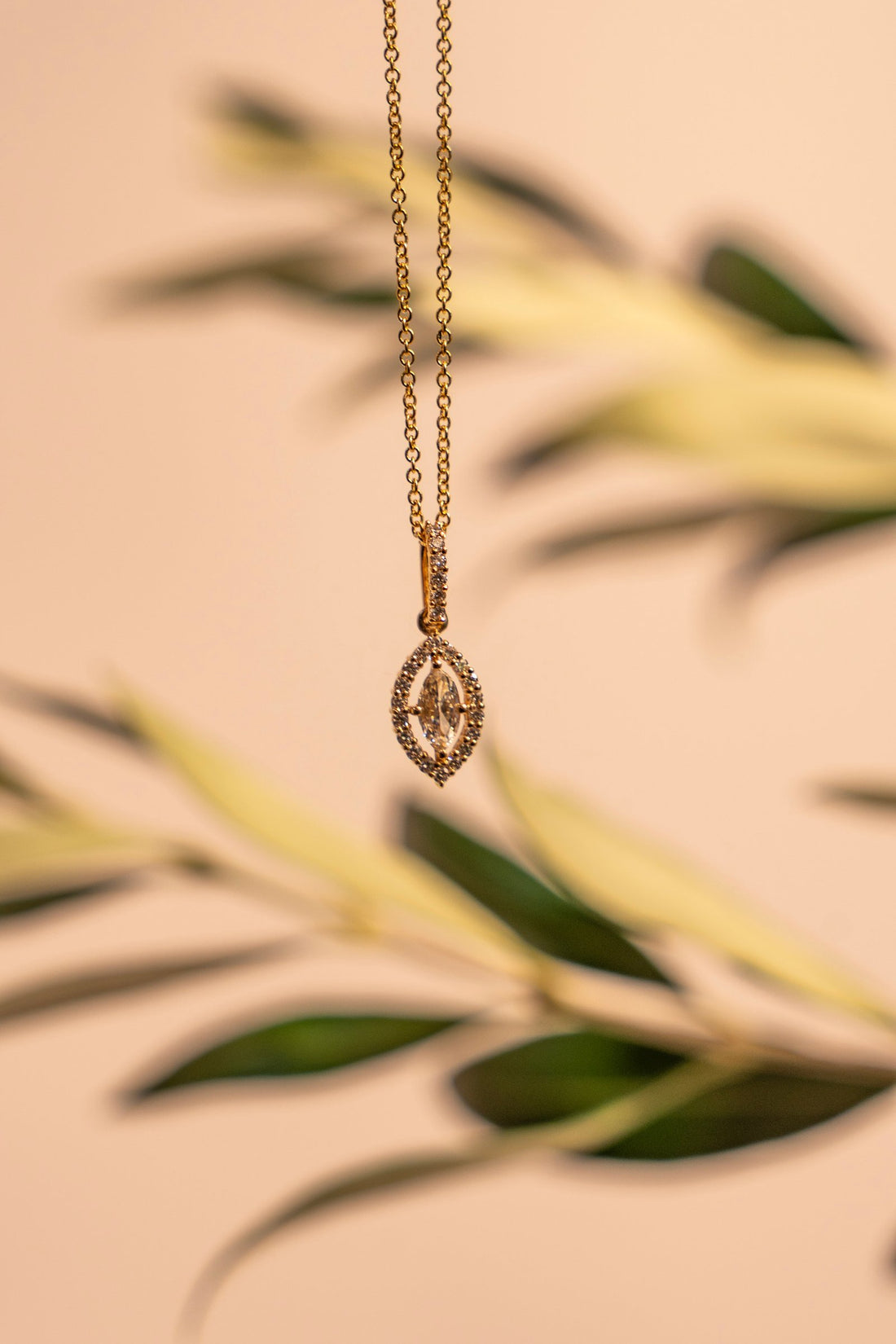 Marquise Diamond and 18Kt Gold Halo Necklace with a Diamond Halo and Diamond Bail 16" in length
