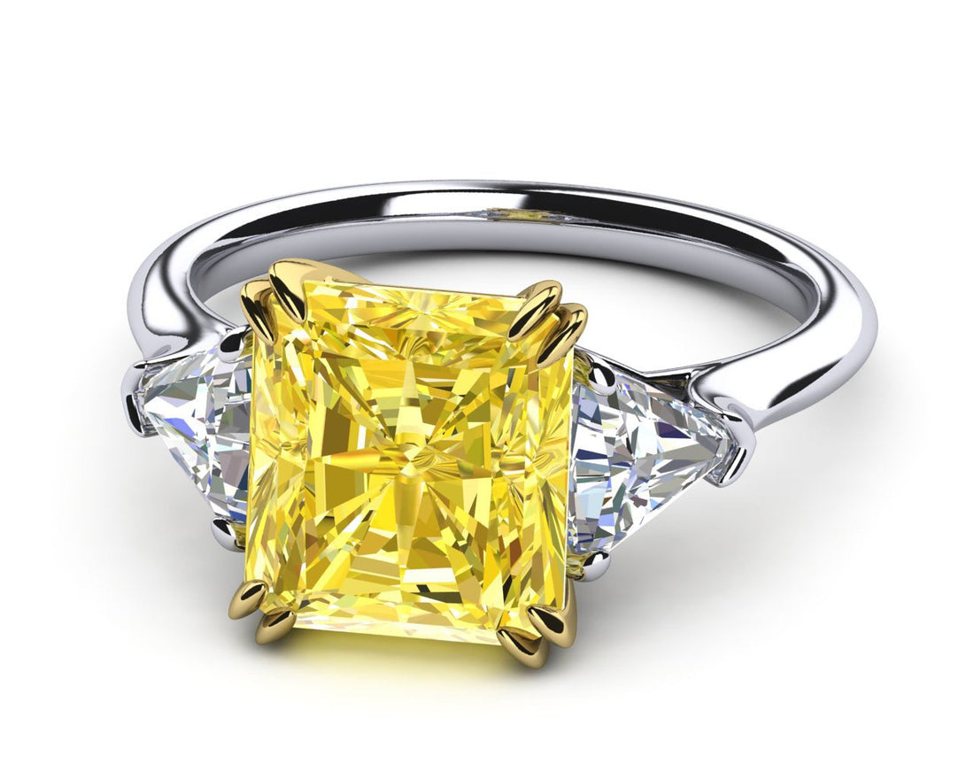 4Ct- Center Stone Heated Yellow Diamond with 2-.5Ct Trillion sides in a Platinum Setting