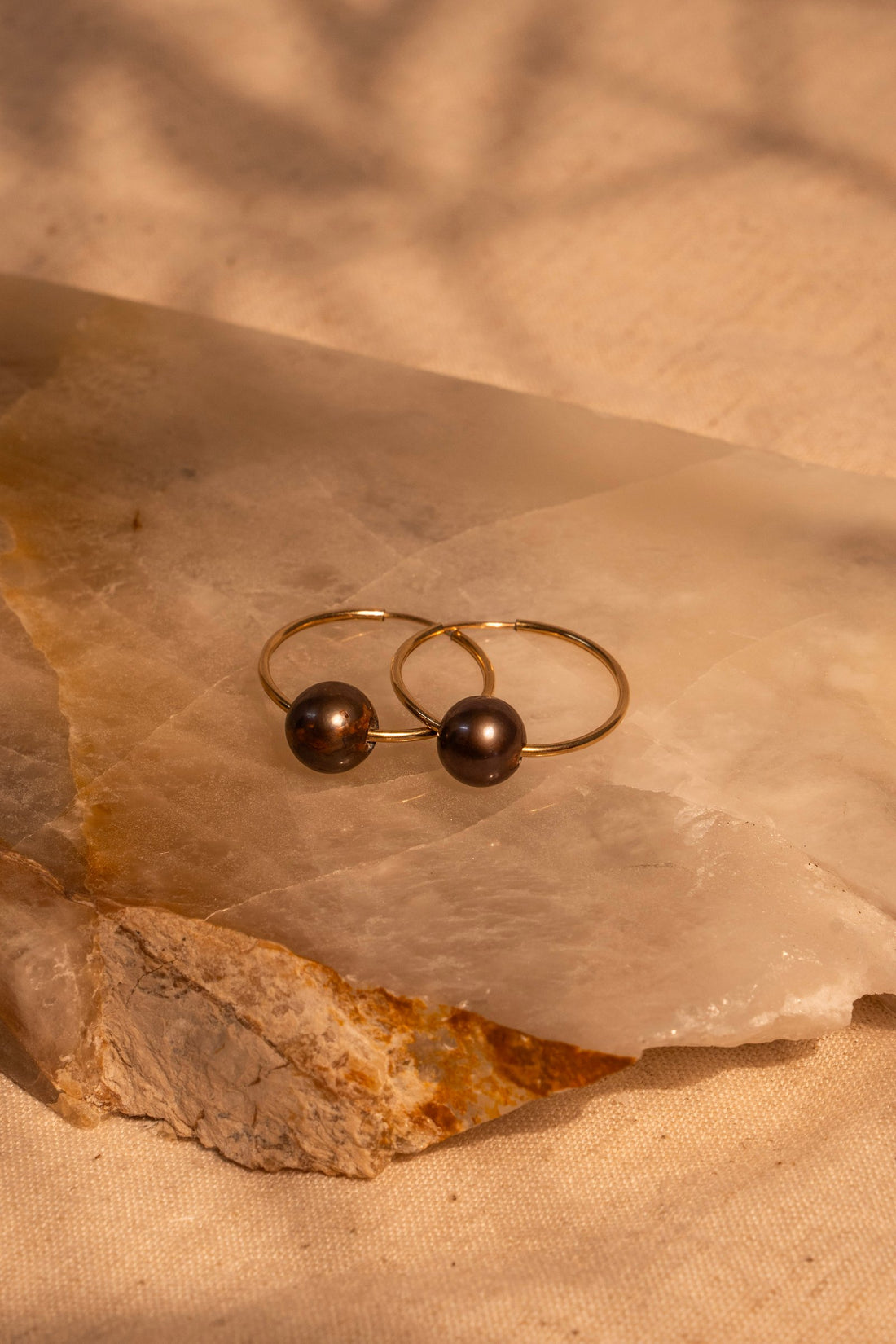 24mm Infinity Hoops with a Tahitian Pearl